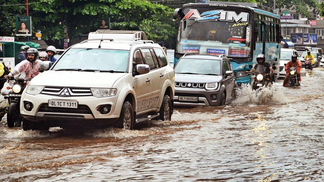 Heavy rains lash Kerala: Orange alert in 9 districts, dam shutters opened amid flooding fears